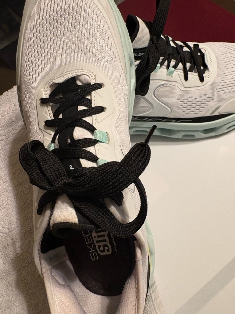Skechers Women's White Sneakers with Black Laces and Mint colored pretty shoe 11